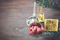 Christmas ornaments hang on Christmas Tree have space wood background Royalty Free Stock Photo