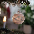 White Christmas Ornaments Hanging from the Tree, Peaceful Warm Lighting