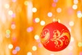 Christmas ornaments over gold blurred background Royalty Free Stock Photo