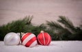 Christmas ornaments with snow and pine tree Royalty Free Stock Photo