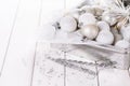 Christmas ornaments over white wooden background Royalty Free Stock Photo