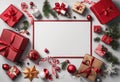 christmas ornaments and presents surrounding an empty white board surrounded by fir tree Royalty Free Stock Photo