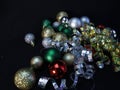 Christmas ornaments and ribbon  sparkly on black backgroud Royalty Free Stock Photo