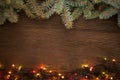 Christmas ornaments on a table in the snow with nice festive background Xmas illuminations