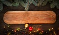 Christmas ornaments on a table in the snow with nice festive background Xmas illuminations