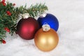 Christmas ornaments and tree branch Royalty Free Stock Photo