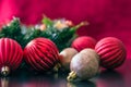 Christmas ornaments wait on the table to be hung up around the house. Royalty Free Stock Photo