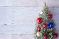 Christmas ornaments on a wood background Royalty Free Stock Photo