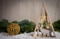 Christmas ornaments with snow, pine tree and xmas lights Royalty Free Stock Photo