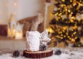 Christmas is over concept. Blown out candle with smoke evaporate. Royalty Free Stock Photo