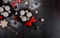 Christmas pan with tasty cookies and chocolate on wood background Royalty Free Stock Photo