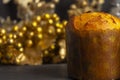 Christmas Panettone with slice and Christmas setting. Typical Italian Christmas holiday cake Royalty Free Stock Photo