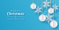 Christmas paper cut 3d snowflakes and balls with shadow on blue background. Minimal design. New year and Christmas card Royalty Free Stock Photo