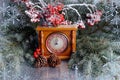 Christmas party decoration. Snow-covered mountain ash branches and Christmas balls Royalty Free Stock Photo