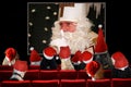 Christmas party, dogs looking Santa Claus movie in Cinema