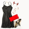 Christmas party outfit. Cocktail dress outfit, night out look on white background. Little black dress, red evening clutch , black