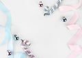 Christmas pastel blue and pink blue ribbon decorate with ornament balls on white background