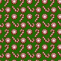 Christmas pattern with candy canes. Vector seamless background. Royalty Free Stock Photo