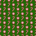 Christmas pattern with candy canes. Vector seamless background. Royalty Free Stock Photo