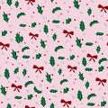 Christmas pattern with holly leaves red berries and burgundy bow on pink background, seamless pattern for Christmas print Royalty Free Stock Photo