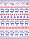 Christmas pattern inspired by Scandinavian cross stitch and Nordic style winter stitching seamless decor including snowflakes, he Royalty Free Stock Photo