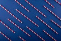 christmas pattern new year cocktail tubes on dark blue background in flat lay Royalty Free Stock Photo