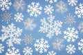 Christmas Pattern white snowflake on blue background. Top view