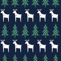 Christmas pattern - Xmas trees, deer, snowflakes on blue background. Royalty Free Stock Photo