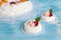 Christmas pavlova cake nests decorated with cranberry and mint