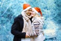 Christmas and people concept - happy young couple in love