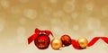 Christmas perfect decoration red and gold yellow balls isolated on golden blurred bokeh background Royalty Free Stock Photo