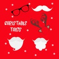 Christmas photo booth props set with Santa hat and beard, reindeer antlers, mustache and glasses. Party decoration. Christmas hats Royalty Free Stock Photo