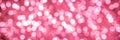 Christmas pink lights background. Bokeh abstract texture. Header of Pinky. Red. Coral. Colorful. Defocused background. Royalty Free Stock Photo