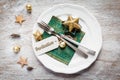 Christmas place setting, plate, napkin, knive and fork