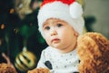 Christmas portrait of cute little newborn baby boy, wearing santa hat Royalty Free Stock Photo