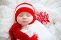 Christmas portrait of cute little newborn baby boy, wearing santa hat Royalty Free Stock Photo