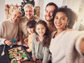 Christmas, portrait and selfie of family cooking cookies in home kitchen, bond and together. Xmas, baking food and happy Royalty Free Stock Photo