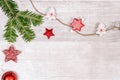 Christmas postcard on a plain wooden background with space for text