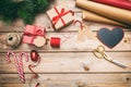 Christmas gift boxes wrapping on wooden background, copy space, top view Royalty Free Stock Photo