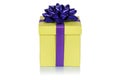 Christmas present birthday gift yellow box ribbon isolated on white