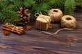 Christmas present box. fir branches with cinnamon and anise on rustic wooden background. flat lay. seasonal greetings concept. win Royalty Free Stock Photo