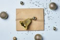 a christmas present with a gold bell on top Royalty Free Stock Photo