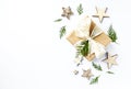 Christmas present with rustic decorations and evergreen twigs. Flatlay. Copy space Royalty Free Stock Photo