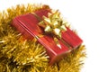 Christmas present and tinsel Royalty Free Stock Photo