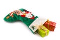 Christmas presents in a christmas stocking Royalty Free Stock Photo