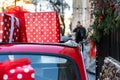 Christmas presents and gift boxes on the roof top of a car Royalty Free Stock Photo