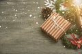 Christmas presents gift red and rustic decorated laid on wooden table background Royalty Free Stock Photo