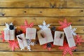 Christmas presents laid on a wooden table background