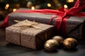 christmas presents with red ribbon and gold ornaments on a wooden table Royalty Free Stock Photo