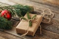 Christmas presents with rustic ribbon on dark wooden background Royalty Free Stock Photo